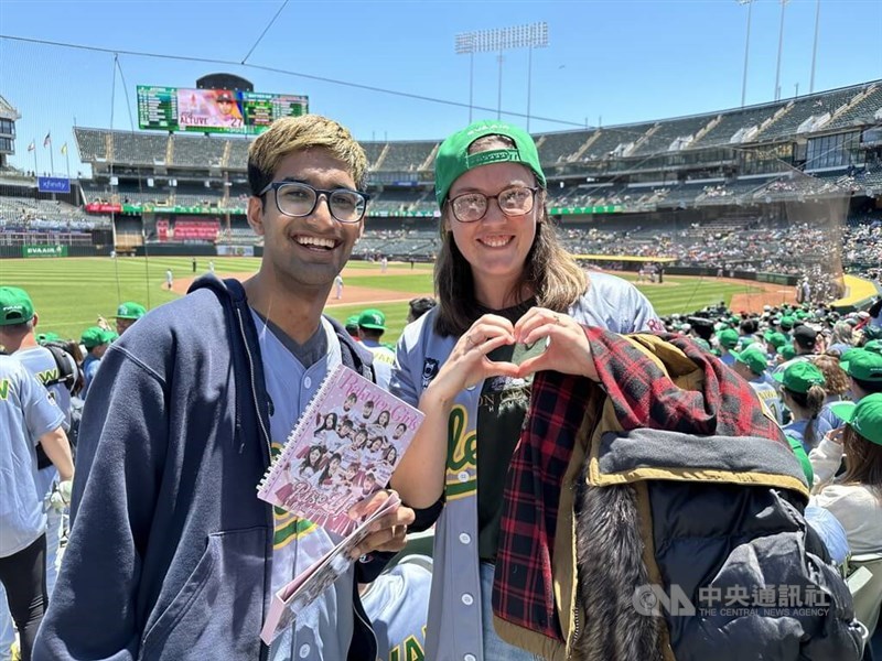 Fans Shadaj Laddad and Laura Power are pictured when they attend the game in Oakland, California Saturday. CNA photo May 28, 2023