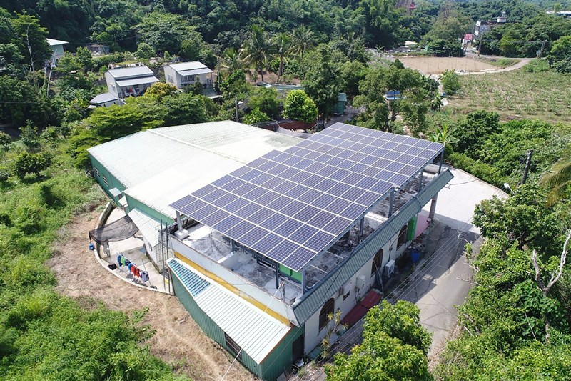 Solar panels cover part of the rooftop of a privately owned building in this photo released by the Kaohsiung City Government on March 11, 2022.