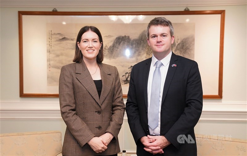 Brooke van Velden (left), deputy head of the ACT New Zealand party, and her colleague James McDowall pose for a photo during an interview with CNA in Taipei Wednesday. CNA photo May 31, 2023