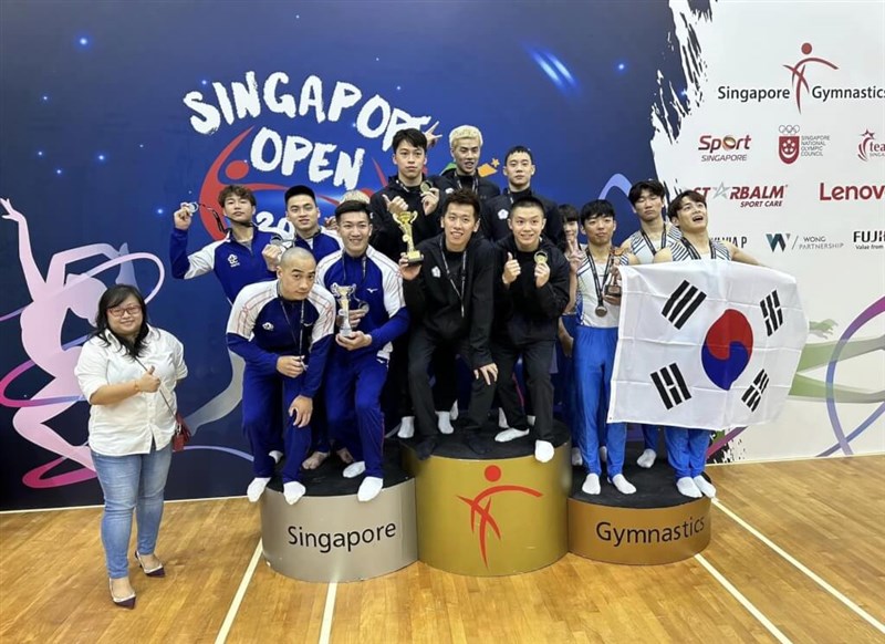 Taiwanese and South Korean gymnasts celebrate their medal wins on the podium at the Singapore Gymnastics Open Championships on Friday. Photo taken from Lin Yu-hsin