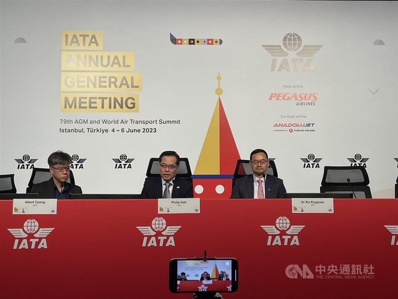 From left: IATA officials Albert Tjoeng, Philip Goh, Xie Xingquan attend a session during the aviation organization
