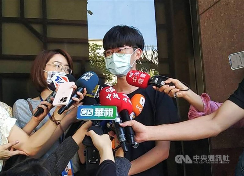 Former Taiwanese political worker Lee Yuan-chun (in black T-shirt) speaks to local media in Taipei on Wednesday. CNA photo June 7, 2023