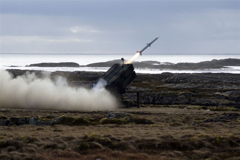 Dutch military launches an AIM-120 missile from a National Advanced Surface-to-Air Missile System 2 (NASAMS 2). Image from Wikimedia Commons, pictured by Ministerie van Defensie