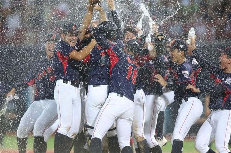 Japan team celebrates victory. CNA photo Sept. 10, 2023