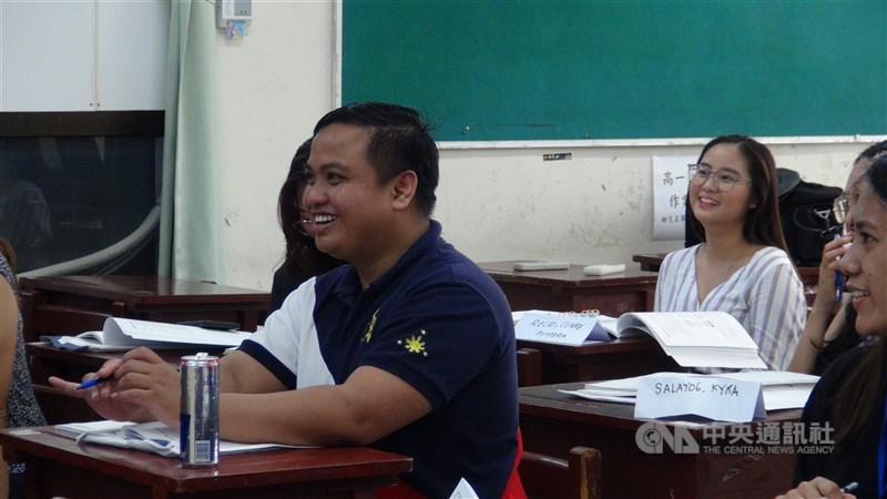 Students smile during a free Mandarin class offered by the Taipei City Government. CNA photo July 15, 2023