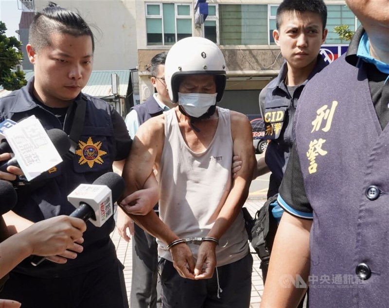 Murder suspect Wu (center) is taken into custody Friday. CNA photo Sept. 15, 2023