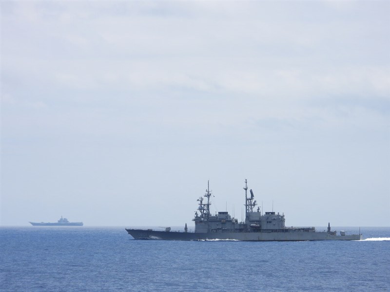 The Keelung (front), the Navy's Kidd-class destroyer, sails not far away from Chinese aircraft carrier, the Shandong (left), to monitor the vessel in this recent photo. Photo courtesy of Ministry of National Defense Sept. 13, 2023