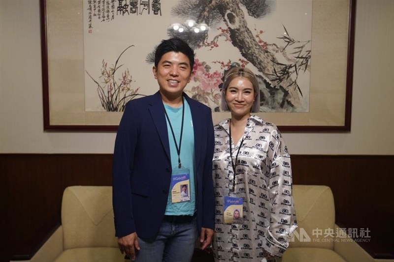 Thitid Tassanakajohn (left), head chef at the Michelin-starred "Le Du" in Bangkok, poses with his social media-influencer girlfriend May Jirutta at the Presidential Office Monday. CNA photo Sept. 18