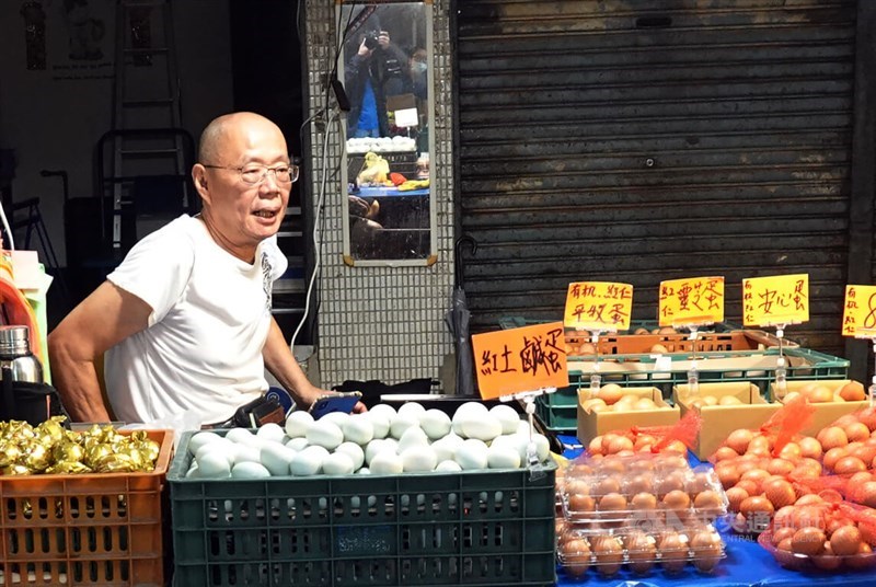 An egg seller tends his stand at a street market in New Taipei's Xizhi District on Sept. 3, 2023
