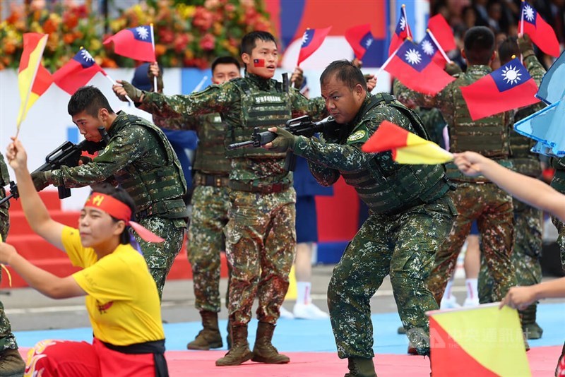 Soldiers demonstrate combat skills during National Day celebration in Taipei Tuesday. CNA photo Oct. 10, 2023