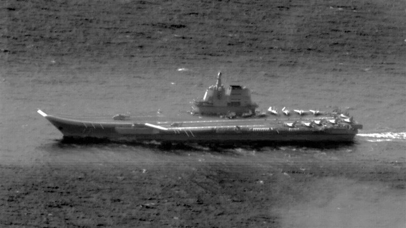 A black-and-white photo of Chinese aircraft carrier the Shandong is taken during the Taiwanese Armed Forces