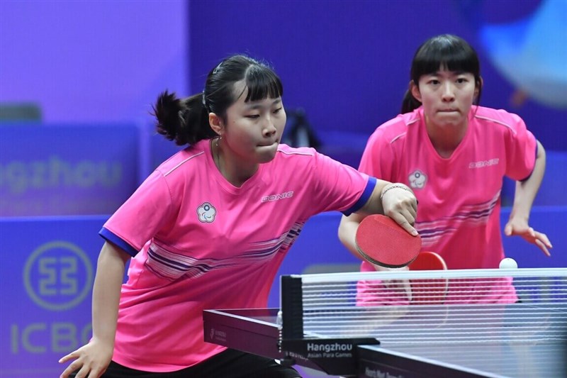 Table tennis player Tian Shiau-wen (left) and Lin Tzu-yu play a match against a duo of China in the women's doubles class WD20 final on Friday at the Asian Paralympic Games in Hangzhou, China. Photo: Sports Administration Oct. 27, 2023