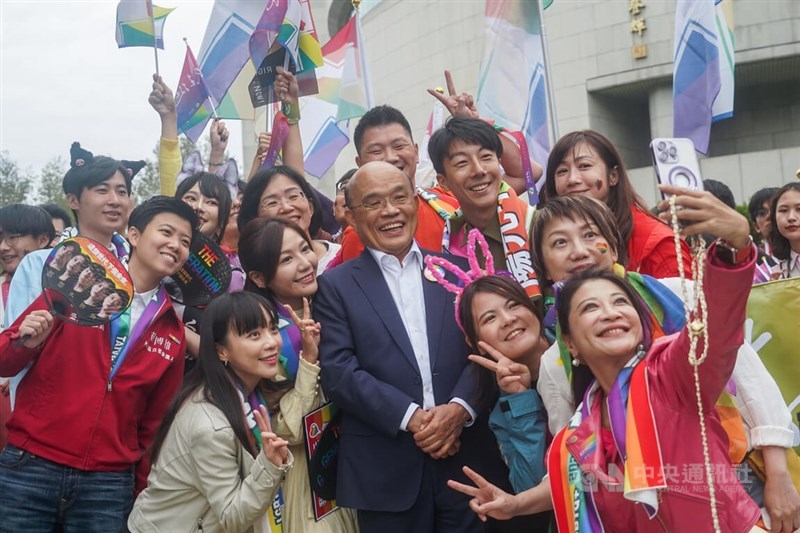 Former Premier Su Tseng-chang (center, in suit) are pictured with lawmakers and legislative candidates of the ruling Democratic Progressive Party at this year's Taiwan LGBT Pride Parade in Taipei on Oct. 28, 2023