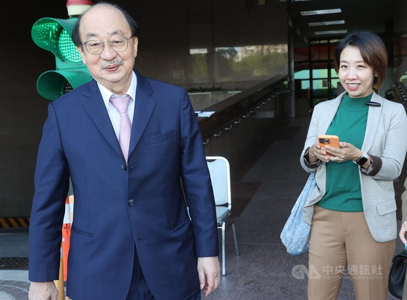 DPP caucus convener Ker Chien-ming (right), who is on the 8th place in the ruling party's list of at-large legislative candidates leaves the party headquarters in Taipei Wednesday, following a meeting held to decide the list. CNA photo Nov. 15, 2023