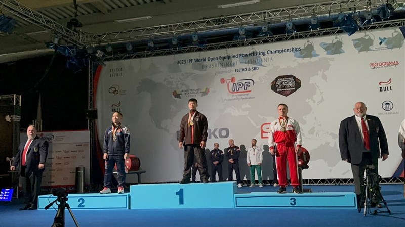 Taiwanese powerlifter Hsieh Tsung-ting (center) is pictured with his gold medal on the podium at the 2023 World Open Equipped Powerlifting Championships in Druskininkai, Lithuania on Tuesday. Photo courtesy of Sports Administration Nov. 15, 2023