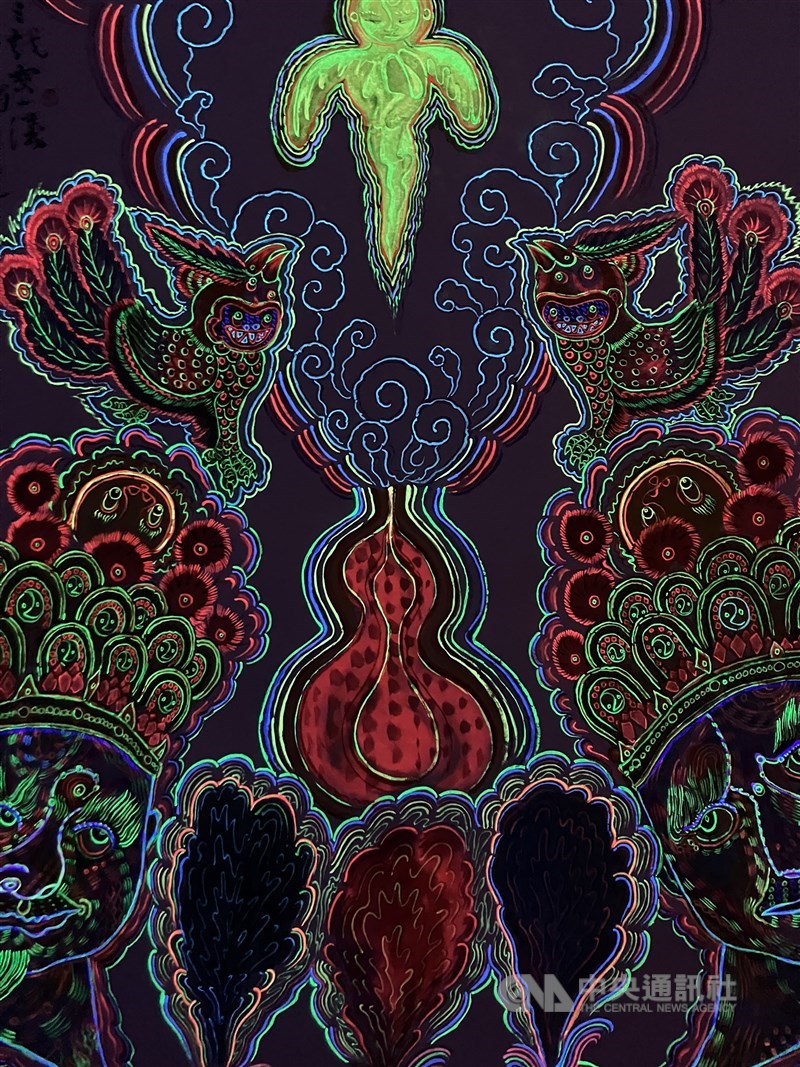 A fluorescent pigment painting by artist Li Jiun-yang depicting a gourd and auspicious beasts is seen at the Taipei Biennial at the Taipei Fine Arts Museum on Friday. CNA photo Nov. 17, 2023
