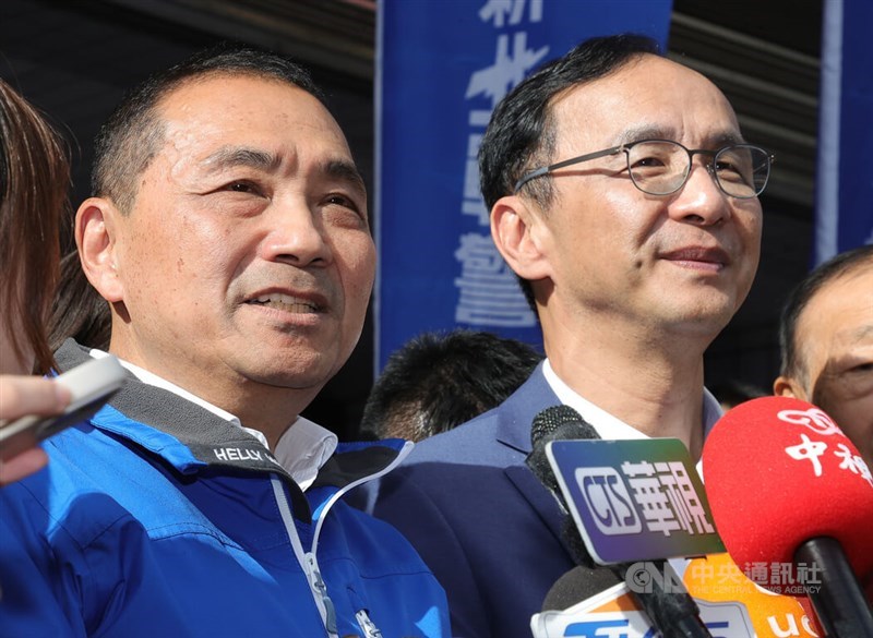 KMT presidential nominee Hou Yu-ih and KMT Chairman Eric Chu speak to reporters on Saturday in Taipei. CNA photo Nov. 18, 2023