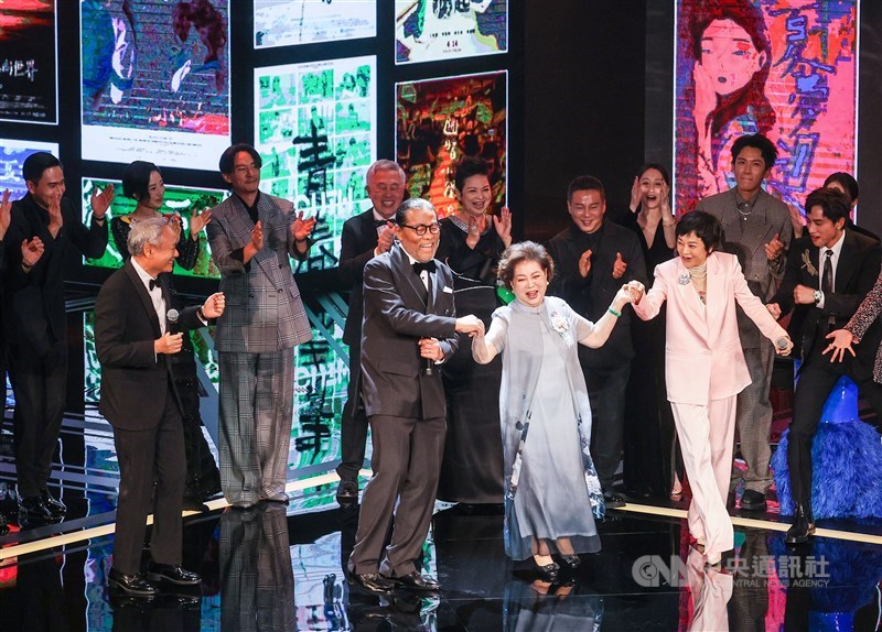 Taiwan-born film director Ang Lee (front left), cinematographer Mark Lee Ping-bing, Golden Horse Award winning-actresses Chen Shu-fang (in light blue dress) and Sylvia Chang (in pink suit) dance on stage at the opening of the Golden Horse Awards ceremony in Taipei Saturday. CNA photo Nov. 25, 2023