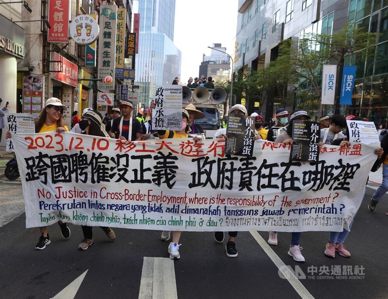 Labor organizations hold a migrant workers' rights parade on World Human Rights Day. CNA photo Dec. 10, 2023