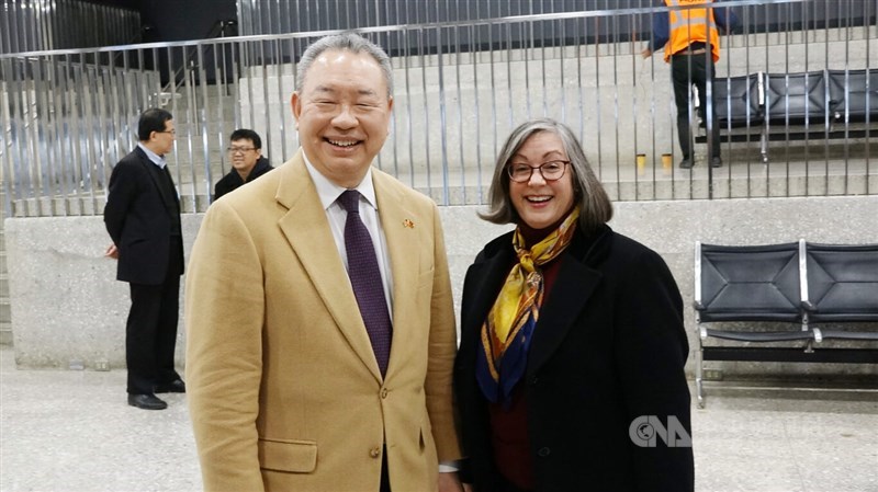 Taiwan diplomat Alexander Yui (left) is greeted by Ingrid Larson, the managing director of American Institute in Taiwan's Washington Office, in Washington on Monday. CNA photo Dec. 12, 2023