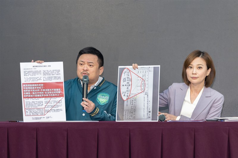Lai Ching-te's campaign spokesperson Kuo Ya-hui (right) and DPP Legislator-at-Large Hung Sun-han show a copy of an old document and a statement to claim that the vice president's New Taipei building has been in place since 1958 during a news conference in Taipei Monday. Photo courtesy of Lai Ching-te's campaign headquarters Dec. 25, 2023