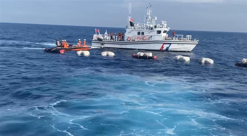 Members of Taiwan's Coast Guard Administration seize smuggled marijuana on Dec. 10. Photo courtesy of Coast Guard Administration