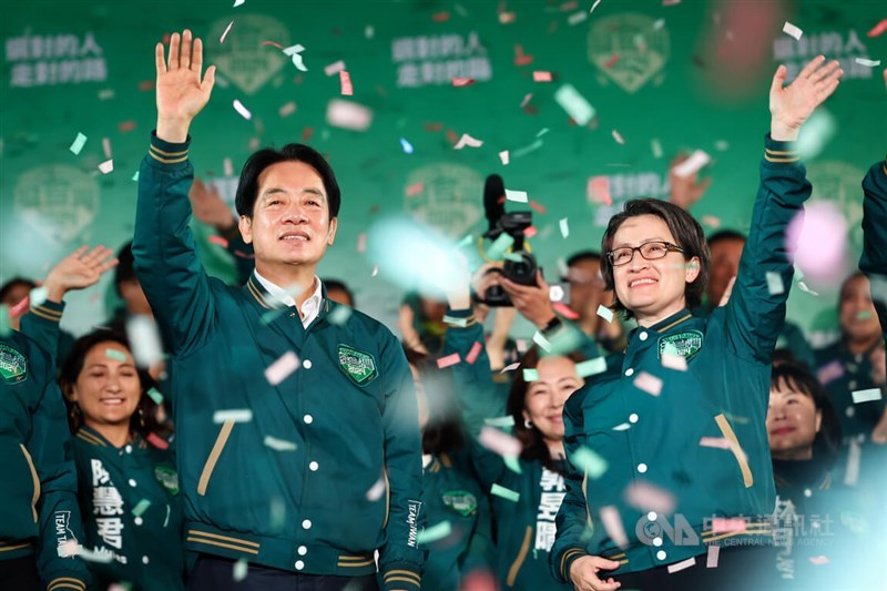 President-elect Lai Ching-te (front left) and vice president-elect Hsiao Bi-khim (front right) wave to supporters outside their campaign headquarters in Taipei on Jan. 13, celebrating their win in the presidential election. CNA file photo