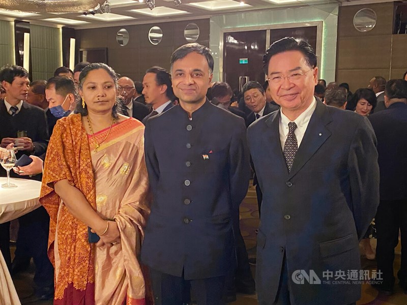 India's representative to Taiwan Manharsinh Laxmanbhai Yadav (center) pose with Foreign Minister Joseph Wu (right) at a Taipei reception to celebrate India's Republic Day on Monday. CNA photo Jan. 22, 2024