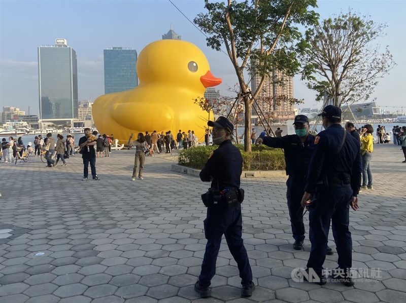 Policemen in Kaohsiung patrol the Love River Bay, where the city is holding the Kaohsiung Wonderland event that features giant rubber ducks by Dutch artist Florentijn Hofman in the southern city on Wednesday. CNA photo Feb. 7, 2024