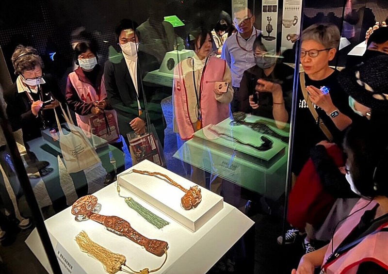 Visitors surround artifacts displayed at the National Palace Museum's southern branch in Chiyi County in this photo released on Tuesday. Photo courtesy of National Palace Museum's south branch Feb. 6, 2024