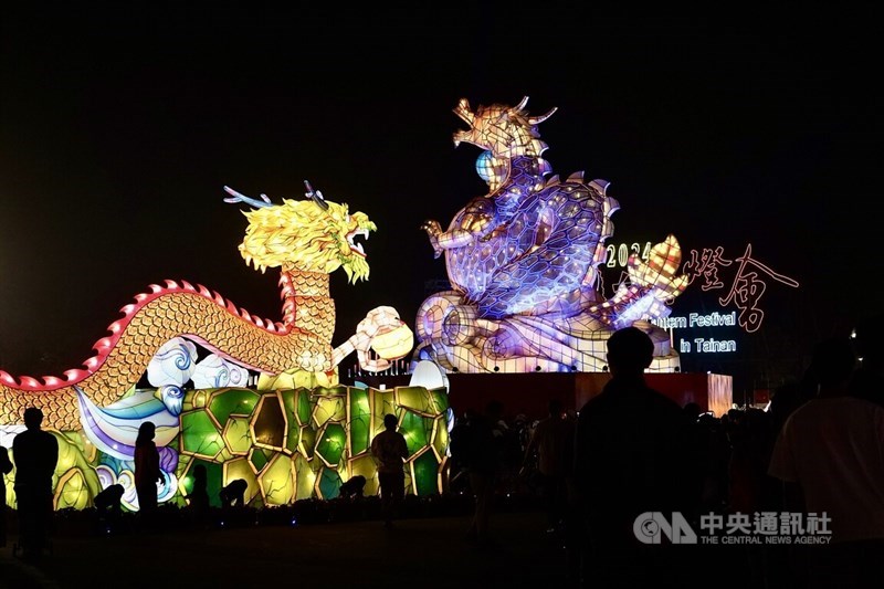 Two large lanterns engineered in the shape of East Asian dragons glow in the dark on Saturday at the 2024 Taiwan Lantern Festival in Tainan. CNA photo Feb. 24, 2024
