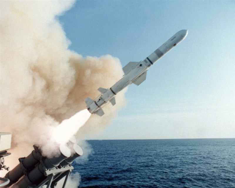 A warship launches a Harpoon missile in this undated picture. Photo taken from the website of The Boeing Company