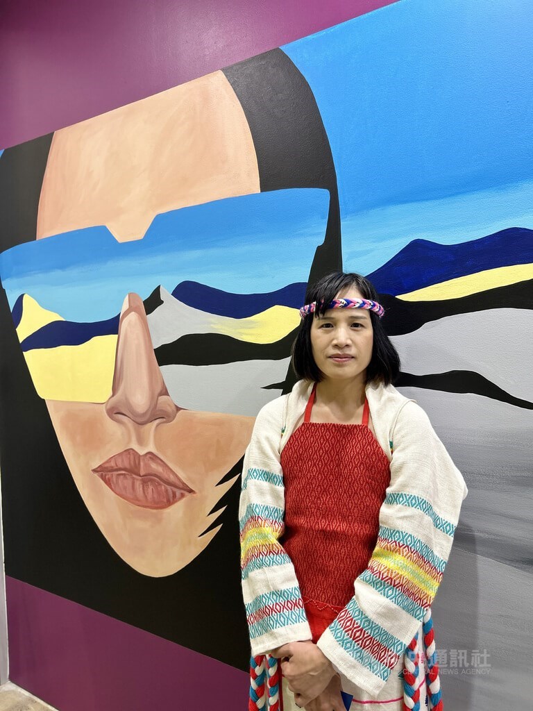 Idas Losin stands next to her work at the Biennale of Sydney in the Australian city on Thursday. CNA photo March 8, 2024