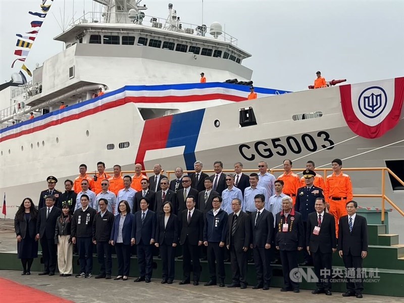 President Tsai Ing-wen (eighth left in front) and Vice President Lai Ching-te (seventh left in front) pose with other Taiwanese officials and coast guards in front of a 4,000-tonne Chiayi-class Coast Guard offshore patrol vessel. CNA photo March 9, 2024