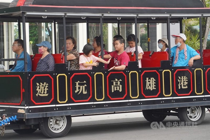 Visitors to the Port of Kaohsiung take a tour vehicle in this photo taken in August 2023. CNA file photo