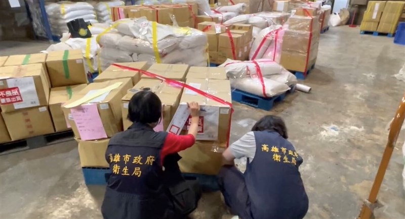 Kaohsiung City government workers seal boxes of goods produced with Sundan dyes-contaminated products in this photo released on Monday. Photo courtesy of Kaohsiung City Department of Health March 11, 2024