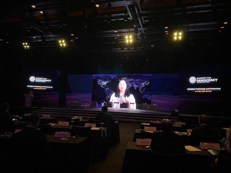 Digital Minister Audrey Tang (on screen) speaks in a pre-recorded video at the Summit for Democracy in Seoul Monday. Photo courtesy of MOFA March 21, 2024