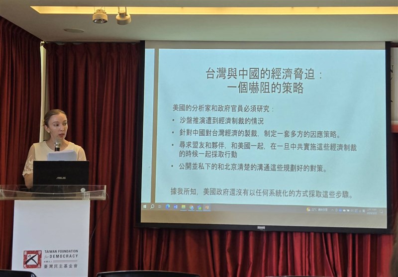 Bethany Allen, author of the book "Beijing Rules: How China Weaponized Its Economy to Confront the World," gives a talk in Taipei on Friday. CNA photo March 22, 2024