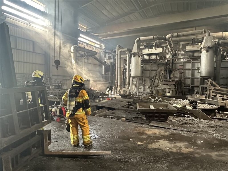 Kaohsiung firefighters examine the aftermath of an explosion at Juei Feng Aluminium Co., Ltd.'s plant in the southern port city Saturday morning. Photo courtesy of Kaohsiung Fire Bureau
