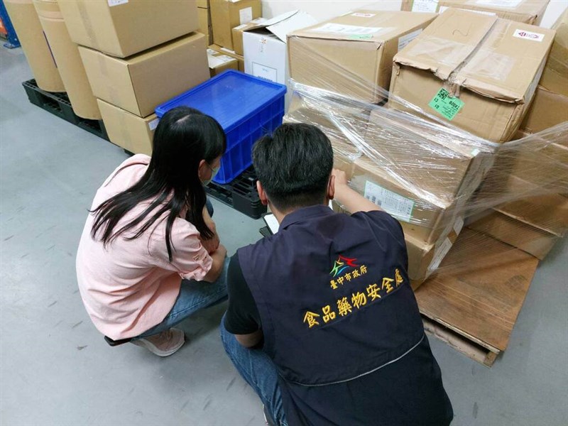 Taichung City government workers inspect a company for red yeast rice products made by Kobayashi Pharmaceuticals in Japan on Tuesday. Photo courtesy of a private contributor March 26, 2024