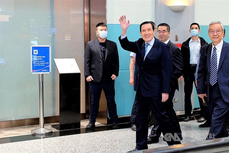 Former President Ma Ying-jeou (second left) waves to the press at Taiwan Taoyuan International Airport before he embarked on his trip to China on Monday. CNA photo April 1, 2024