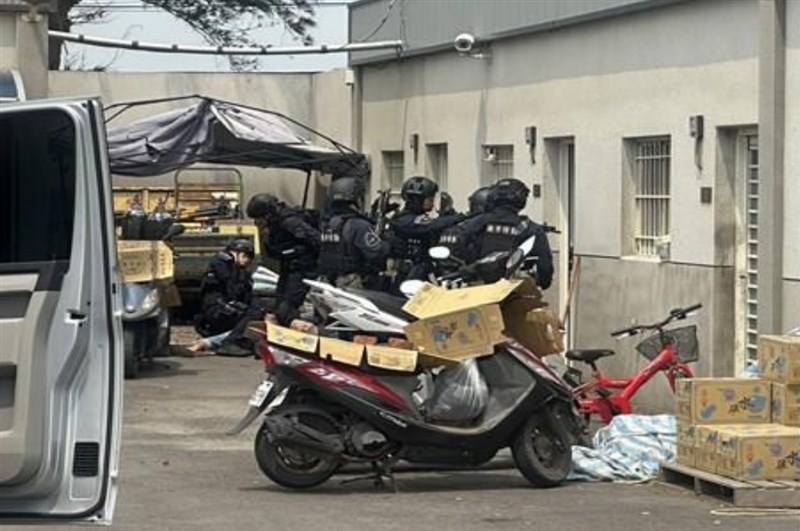 Law enforcement officers get ready to raid the residence of Vietnamese suspects in a kidnapping case of a fellow Vietnamese national. Photo courtesy of Yunlin District Prosecutors Office