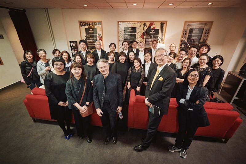 NSO Music Director Jun Märkl (front row, third left) and orchestra members are pictured with Taiwan's representative in France François Wu (front row, second right) and Deputy Culture Minister Lee Ching-hwi (front row, second left) at the backstage of the Théâtre des Champs-Élysées in Paris Saturday. Photo courtesy of NSO April 14, 2024