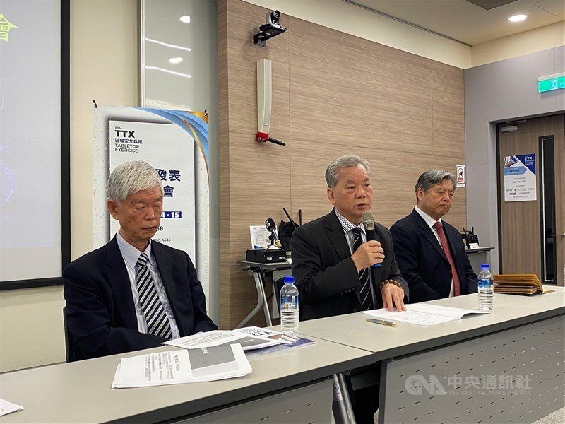 Chen Chung-hsing (center), an adjunct professor at Chinese Culture University Institute of National Development and Mainland China. CNA photo April 15, 2024