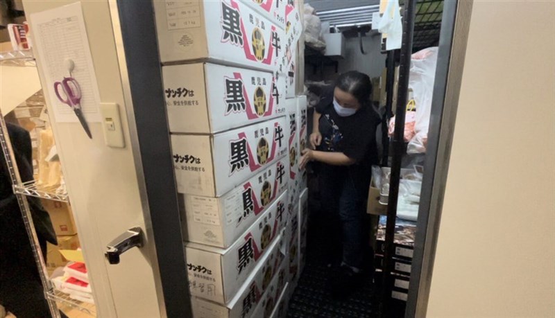 An official from the Taichung Office of Food and Drug Safety seals expired food items at a Japanese-style barbecue restaurant in this recent photo. Photo courtesy of a private contributor April 14, 2024