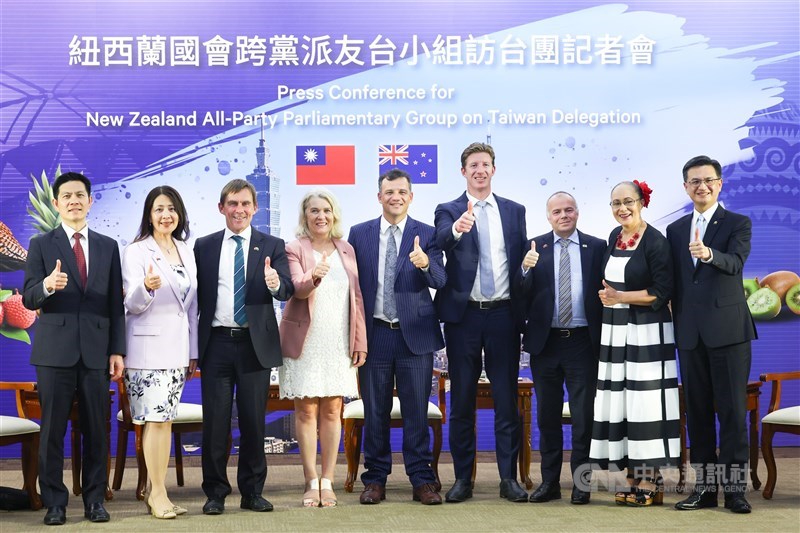 A parliamentary delegation from New Zealand, led by MP for Southland and Chair of the Social Services and Community Select Committee Joseph Mooney (fifth left) and MP for Taieri and Co-chair of the All-Party Parliamentary Group on Taiwan Ingrid Leary (fourth left), poses for a group photo at the Ministry of Foreign Affairs in Taipei on Tuesday. CNA photo April 16, 2024