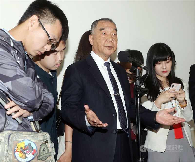 Defense Minister Chiu Kuo-cheng (front center) speaks to reporters on the sidelines of a legislative session Wednesday. CNA photo April 24, 2024