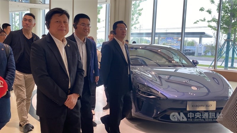 KMT legislative caucus whip Fu Kun-chi (third right) visits Xiaomi's car factory in Beijing Saturday. CNA photo April 27, 2024