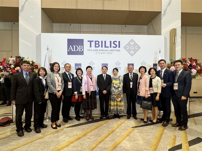 Finance Minister Chuang Tsui-yun (sixth left) and members of Taiwan's delegation to the 57th annual meeting of the Asian Development Bank in the Georgian capital of Tbilisi pose for a picture with the bank's President Masatsugu Asakawa (seventh left). Photo courtesy of Ministry of Finance