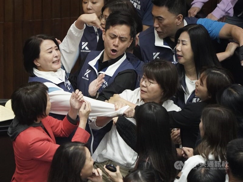 Legislators get physical on Friday when voting on controversial bills aimed at reforming the legislative body. CNA photo May 17, 2024